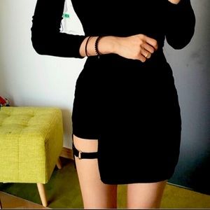 Black mini skirt with a side buckle